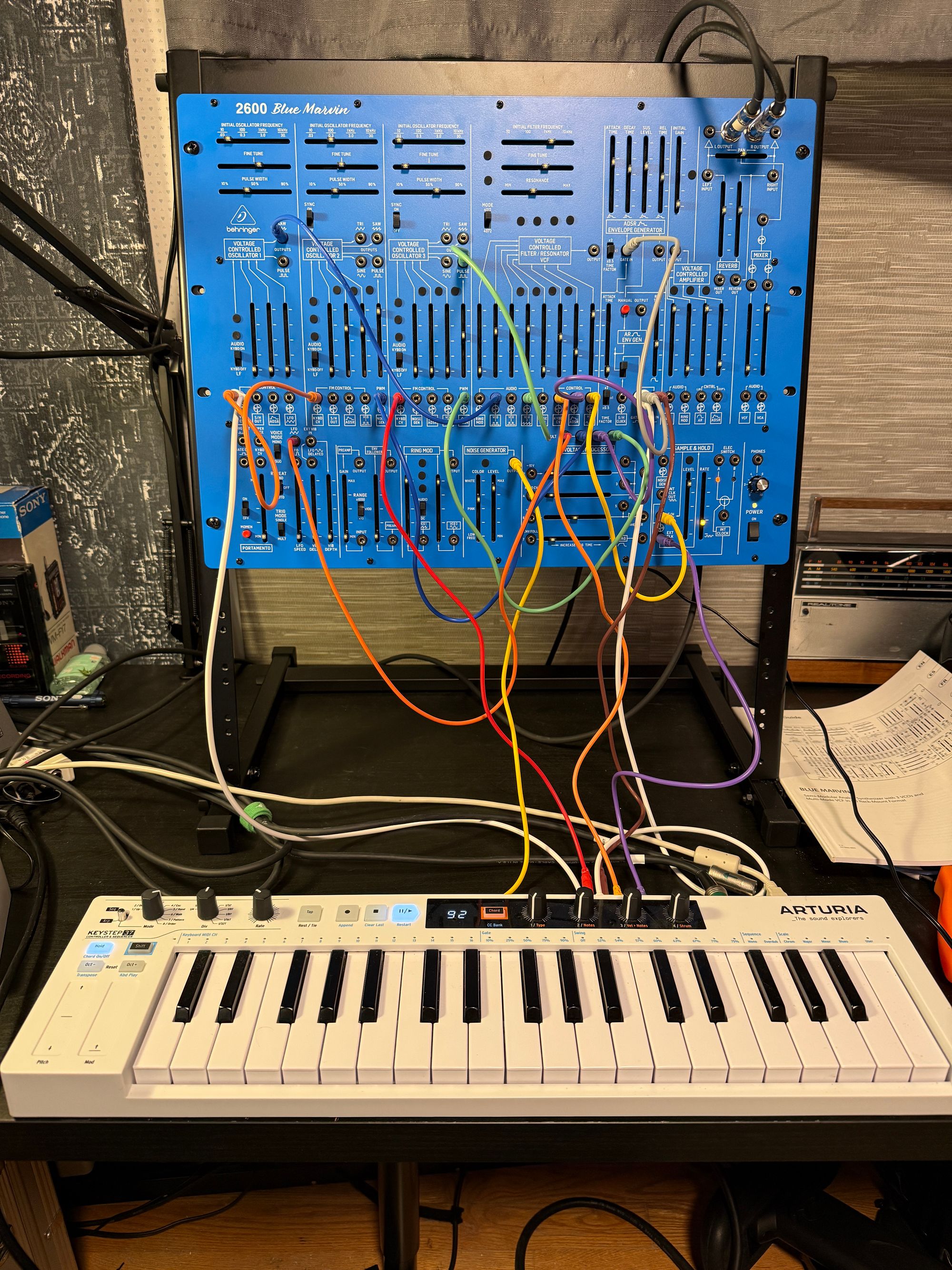 Behringer 2600 "Blue Marvin" semi-modular synthesizer in rack above Arturia Keystep 37 MIDI/CV controller keyboard